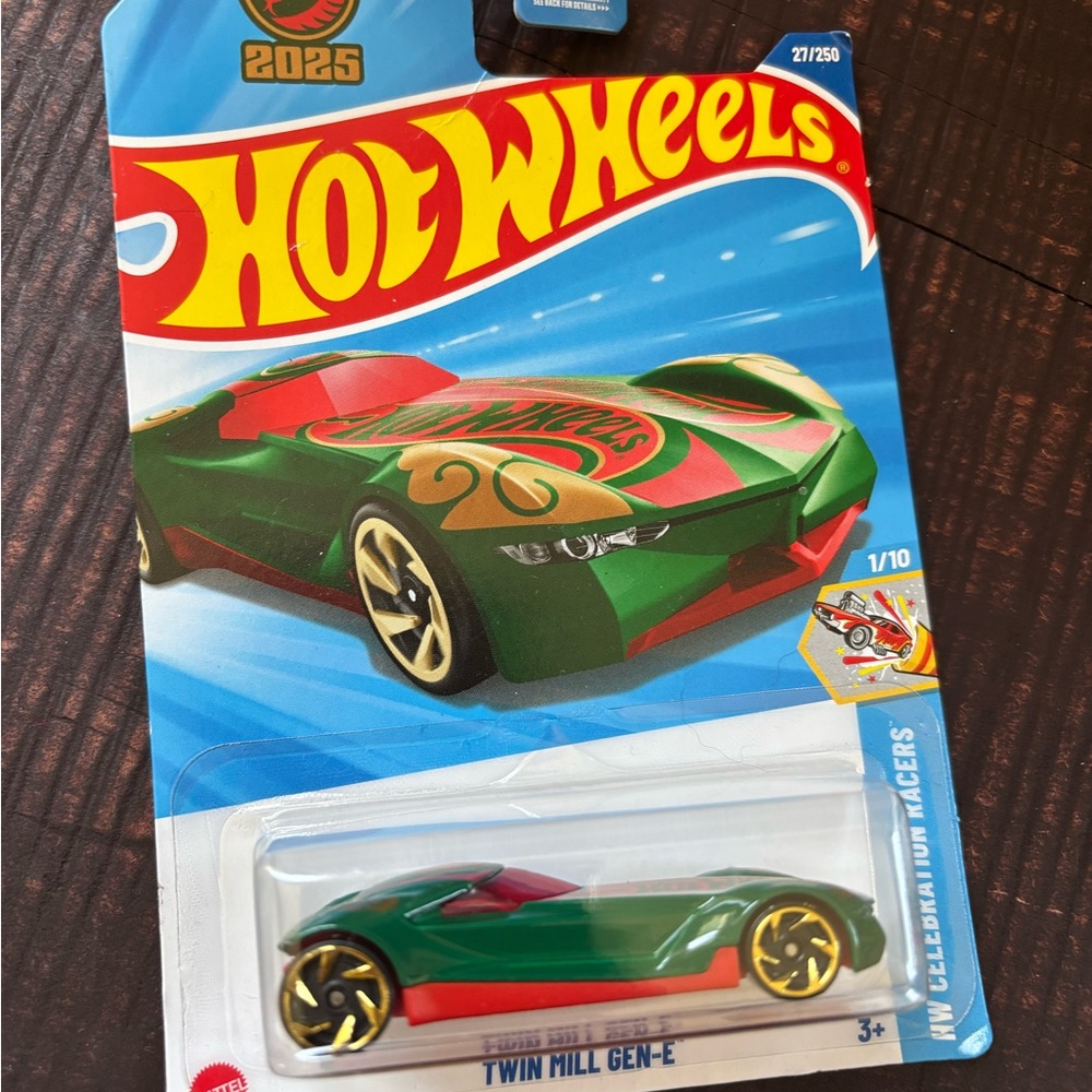 Green Die-Cast Hot Wheels Car with Racing Design